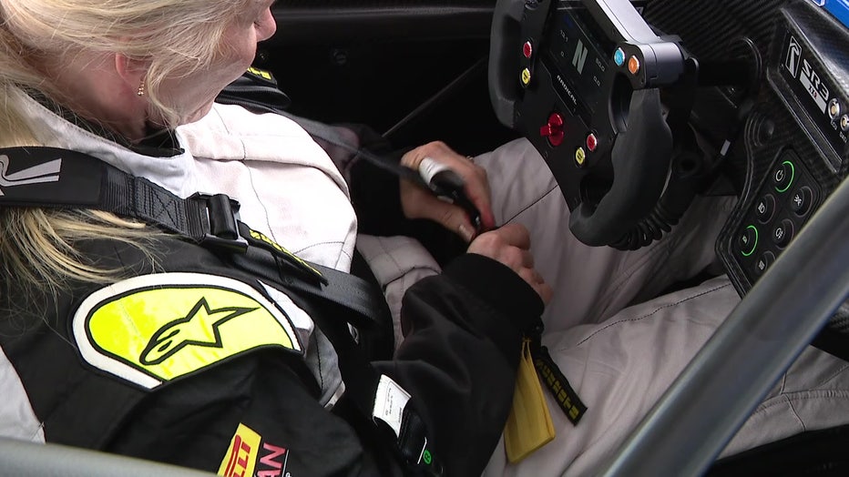 Pictured: Marta Hansen behind the wheel of a Radical race car.