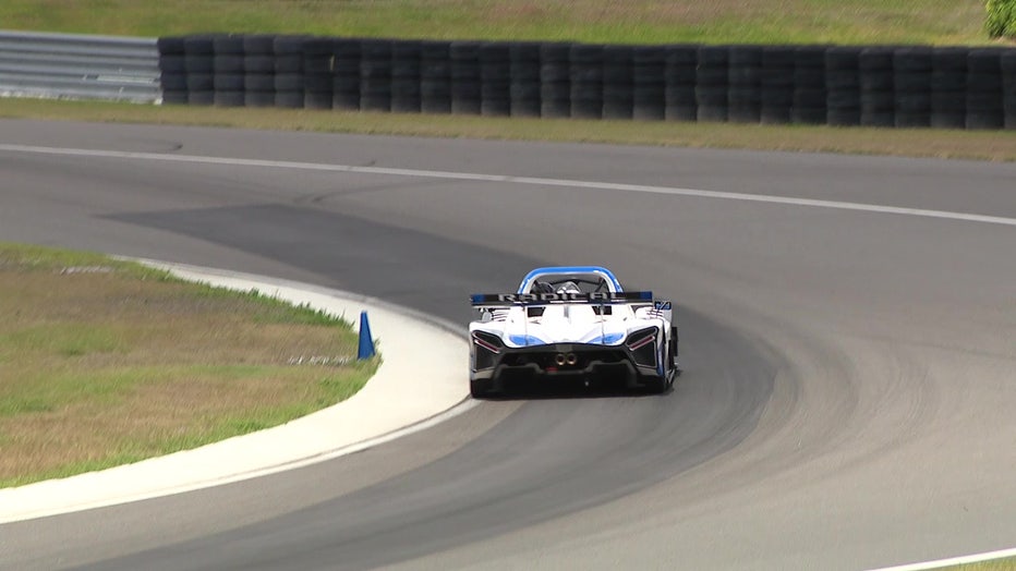 Pictured: A Radical race car on the track at The Motor Enclave.