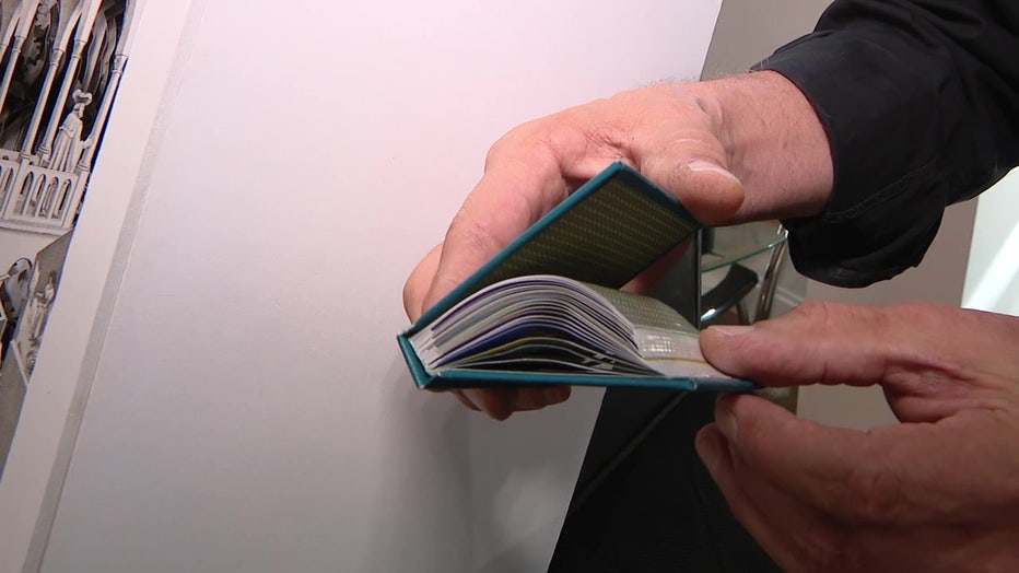 Ted Wray cuts into books to create works of art that can take 8-80 hours to complete.