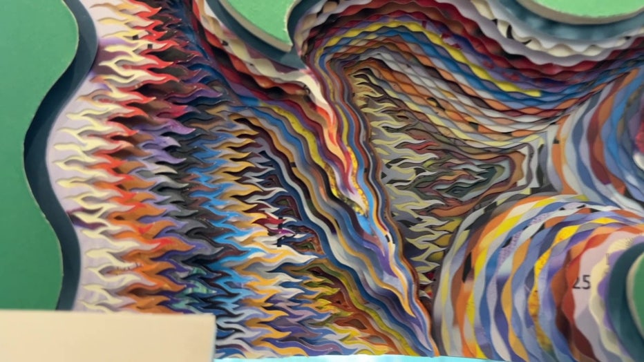 Ted Wray cuts into books to create works of art that can take 8-80 hours to complete.