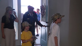 Two families get mortgage-free houses in Tunnels to Towers village