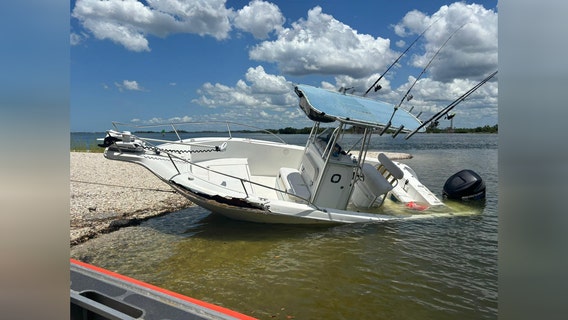 Coast Guard rescues 2 boaters after boat crashes into dayboard