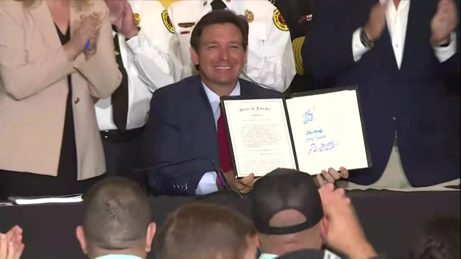 Pictured: Gov. Ron DeSantis signs HB 929 in Palm Beach Gardens on June 5, 2025.