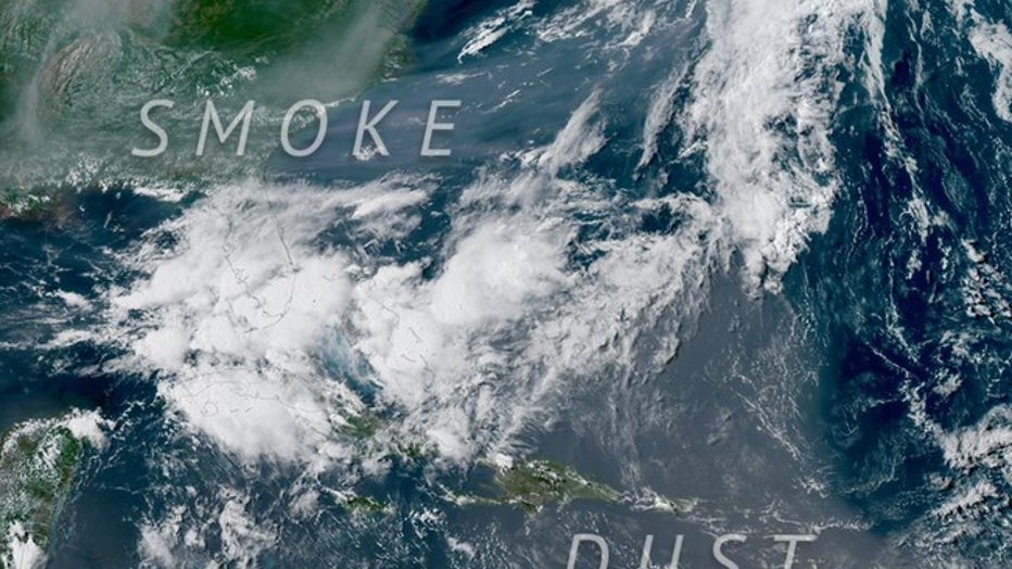 This NOAA GOES satellite image produced by CSU/CIRA shows the wildfire smoke and the dust haze over the U.S. this week. (CSU/CIRA & NOAA)