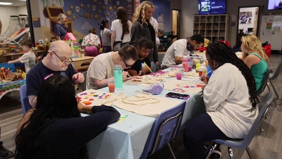 Carrollwood high school student creates Arts for Care; a program for people with developmental disabilities