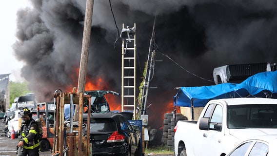 Forklift fire spreads to about 20 cars inside Tampa salvage yard, 1 person hospitalized: HCFR