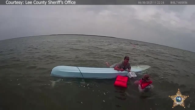 Video: Florida deputies rescue 2 men clinging to capsized boat