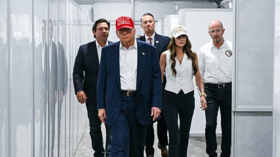 President Donald Trump, Secretary Kristi Noem and Gov. Ron DeSantis tour "Alligator Alcatraz." (Getty Images)
