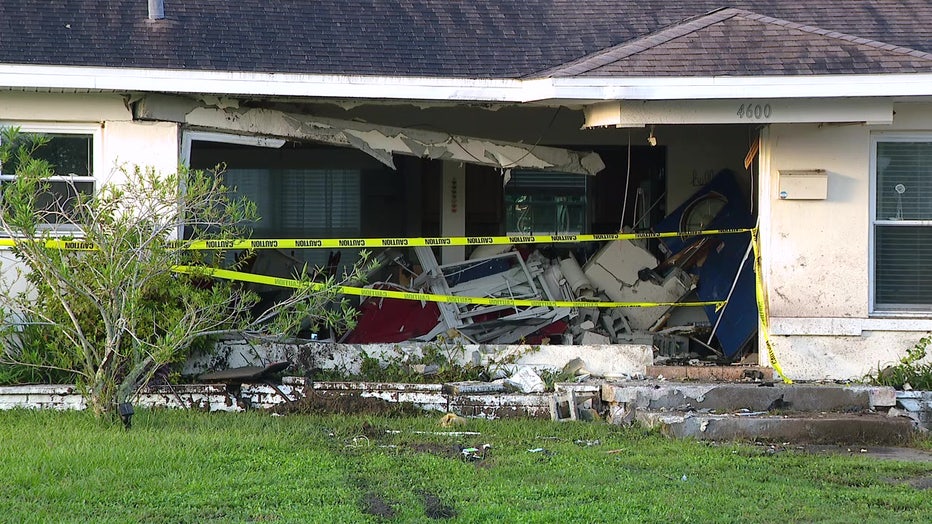 A driver is recovering from injuries after crashing into a home with two people inside early Monday, according to the St. Petersburg Police Department.