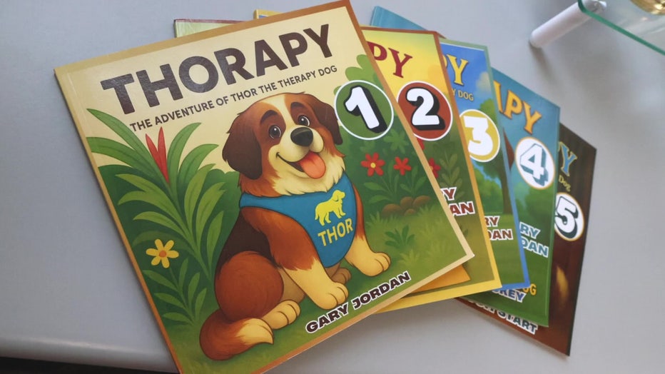 Thor, a 190-pound St. Bernard, provides therapy for people of all ages while inspiring young readers.