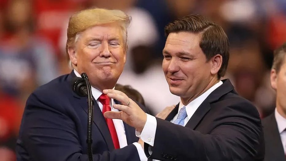 President Donald Trump and Florida Gov. Ron DeSantis at the podium. (Joe Raedle/Getty Images)