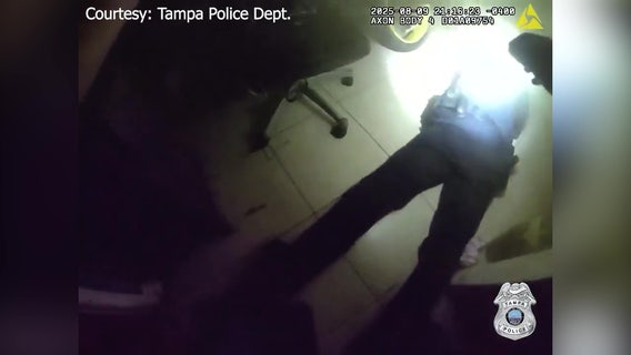 Video: Tampa police rescue man from burning home
