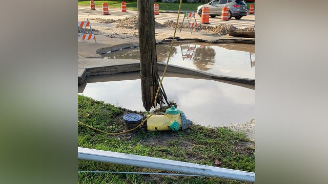 Hole forms on St. Pete road after car spins out, striking fire hydrant, power pole: police