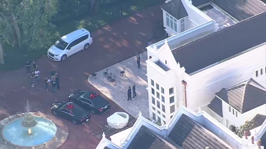 Pictured: FBI raid of home in Avila neighborhood.