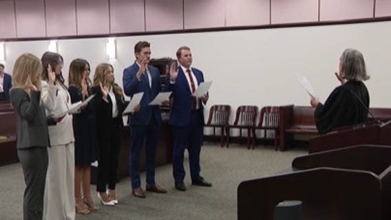 Tampa judge swears in daughter, fellow law graduates
