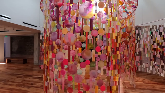 "Through The Veil" encourages visitors at the Sarasota Art Museum to walk through the work