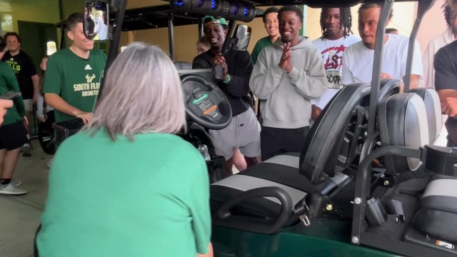 USF men's basketball team gives back to long-time team administrative specialist