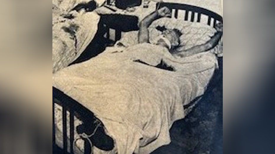 The Macabre Scene of Norman Browne's Body still tied to the bedposts. Bed where Anne Browne was tortured is on left.