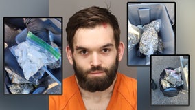 Drug, gun arrest after man found asleep in car at St. Pete apartment: police