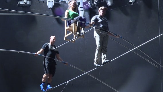 Wallenda siblings attempt to break world record at UTC with Criss Cross wire walk