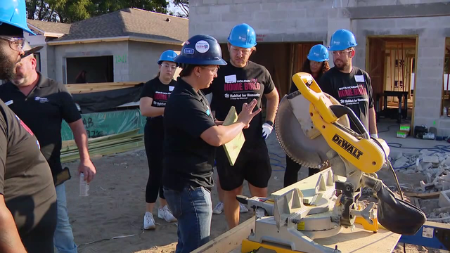 Bucs give back building homes through Habitat for Humanity