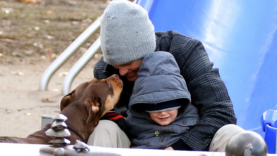 BOSTON, MA - JANUARY 12: Tom Brady is seen at a local playground with his son, Benjamin Brady, and dog Lua on January 12, 2014 in Boston, Massachusetts. (Photo by Stickman/Bauer-Griffin/GC Images)