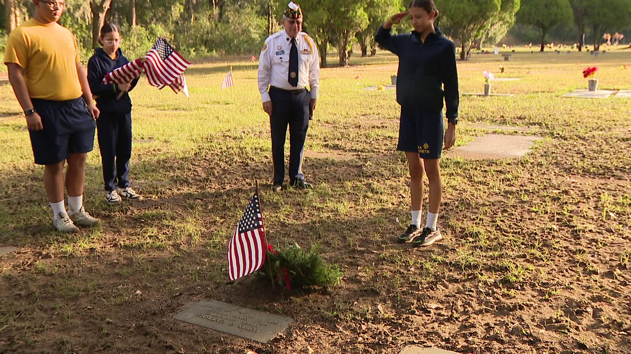 Volunteers honor generations of veterans at Lutz Cemetery during Wreaths Across America
