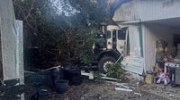 Garbage truck slams into mobile home after being rear-ended by pumping truck: FHP