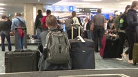 Holiday travel surge underway with calmer airports on Christmas Day