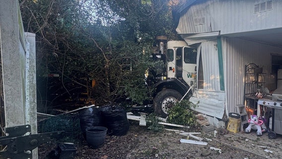 Garbage truck slams into mobile home after being rear-ended by pumping truck: FHP