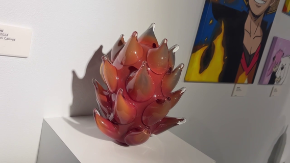 Artist uses molten glass and fire to shape ideas into reality