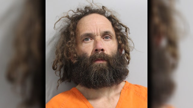 Driver found with multiple weapons, container with radioactive warning label arrested in Polk County