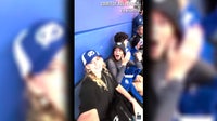 Woman living abroad in Australia surprises best friend at Lightning home game: 'Tears were shed'