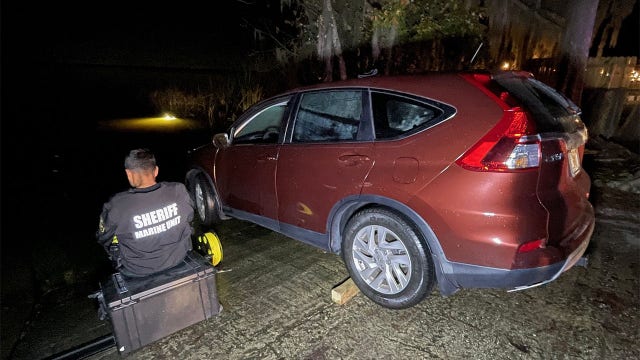 Driver dead, dog saved after SUV found partially submerged in Lake Marion: PCSO