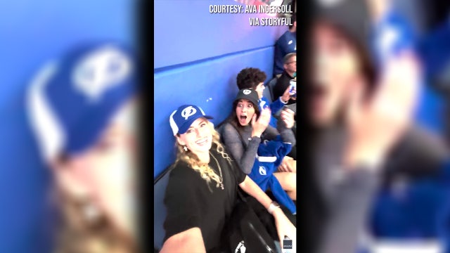 Woman living abroad in Australia surprises best friend at Lightning home game: 'Tears were shed'