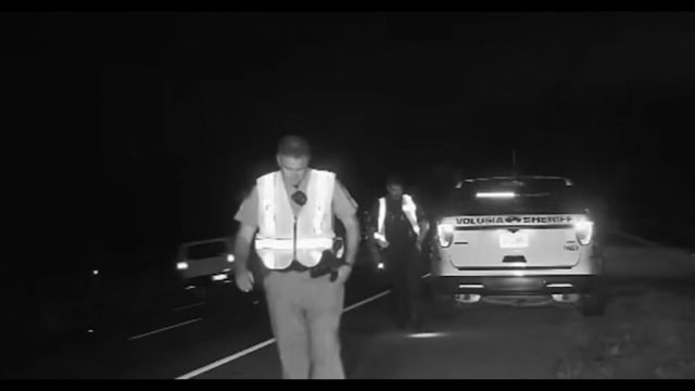 Video: Florida trooper, deputy leap to safety as driver sideswipes patrol vehicles on I-95