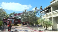 Three-alarm fire tears through townhomes on Longboat Key