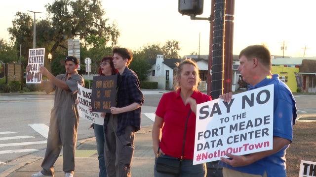 Protesters against proposed Fort Meade data center gather outside city hall