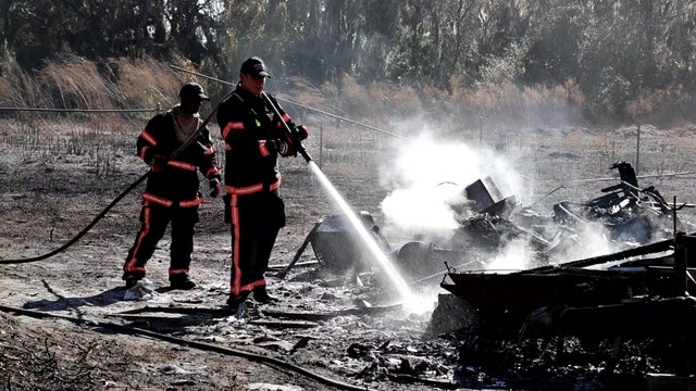 Brush fire breaks out near Lazy Days RV Center as firefighters battle blaze in Lithia: HCFR