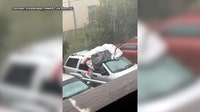Florida man’s wild attempt to save car from hail goes viral: "I’d rather go down trying"