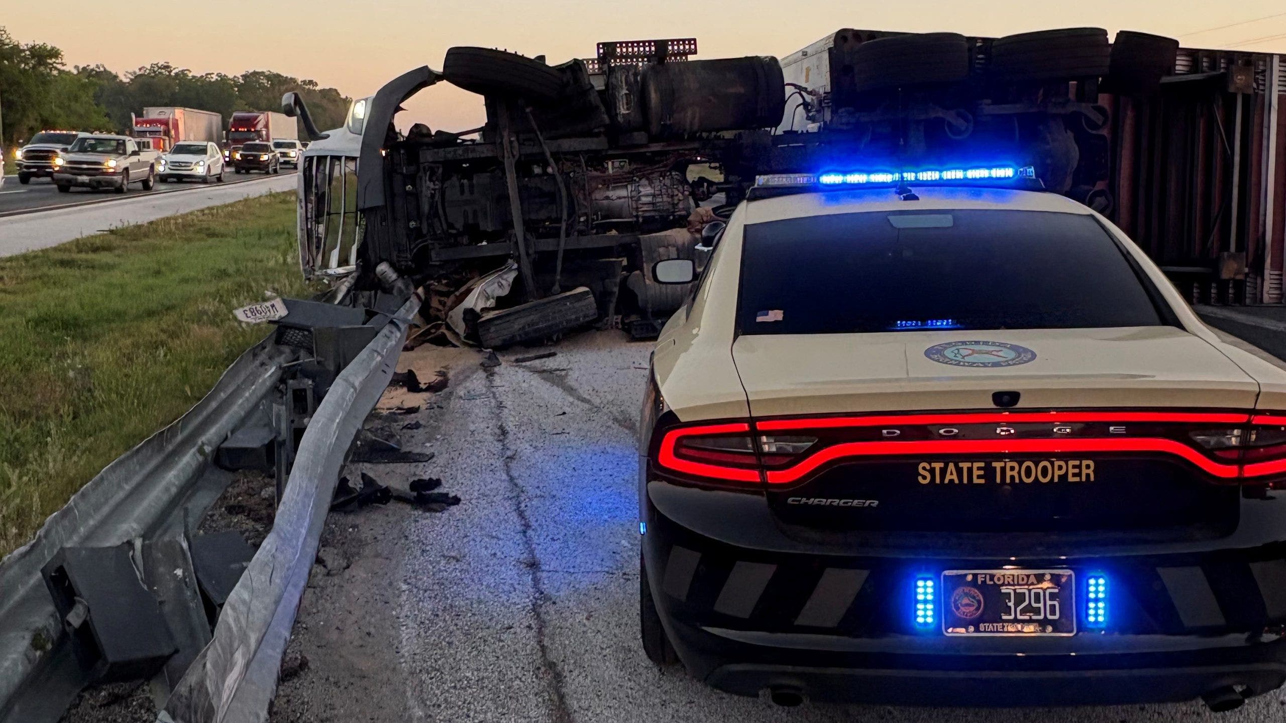 I-75 northbound shut down after tractor-trailer driver falls asleep at the wheel and overturns: FHP