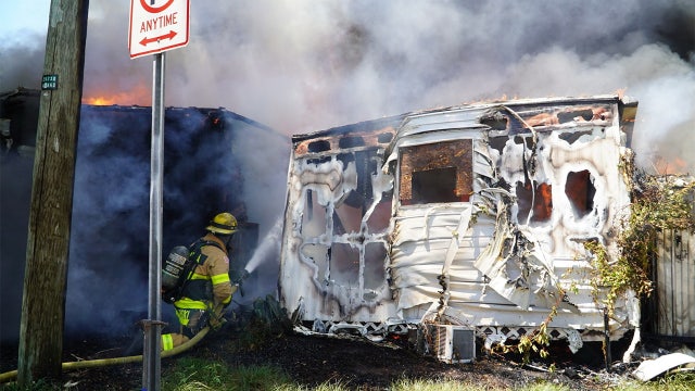 Tampa mobile home fire spreads to at least 4 residences, dog rescued: TFR