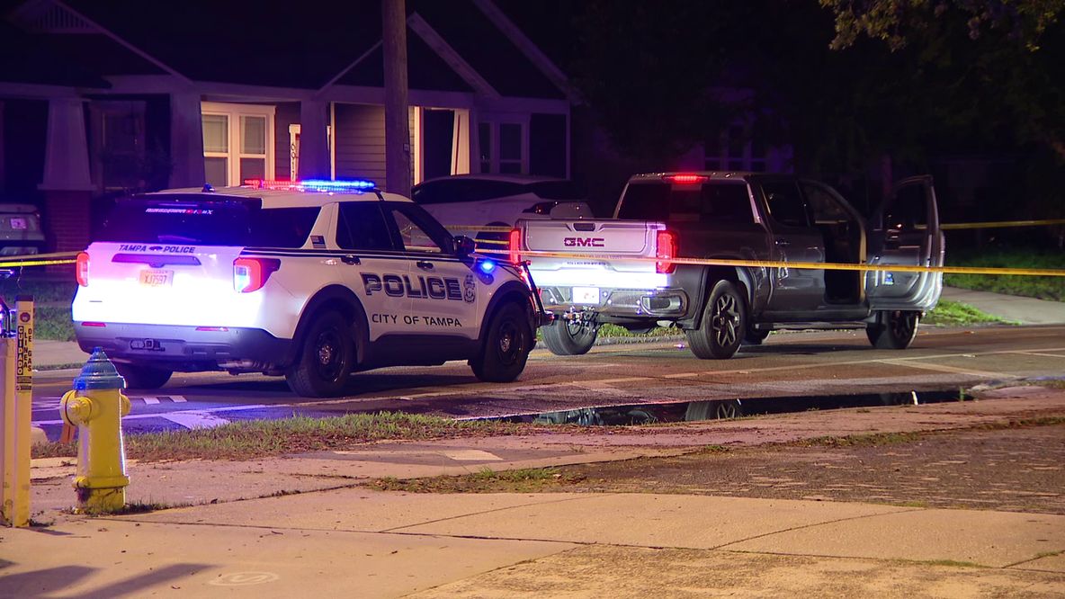Tampa police investigating related scenes after man found dead in vehicle, woman dies in burned home
