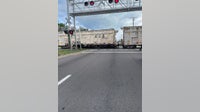 Train derailment shuts down 50th Street and Causeway Boulevard