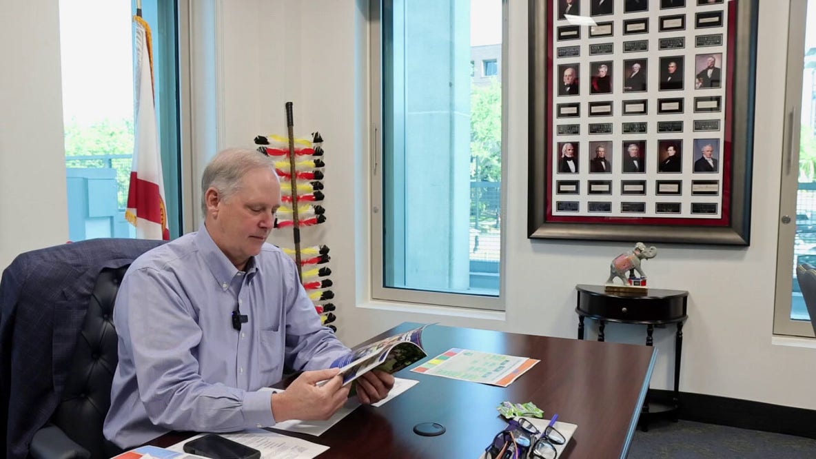 Florida Agriculture Commissioner Wilton Simpson displays every presidential signature in Capitol office