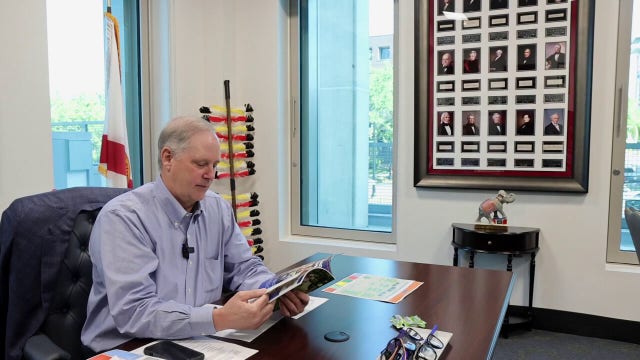 Florida Agriculture Commissioner Wilton Simpson displays every presidential signature in Capitol office