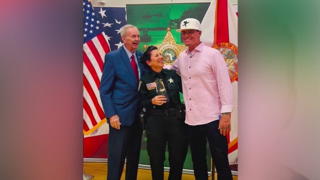 Rapper Vanilla Ice surprises Florida deputy at awards ceremony