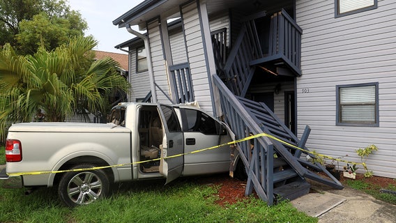 Two children hospitalized after car crashes into Hillsborough County apartment