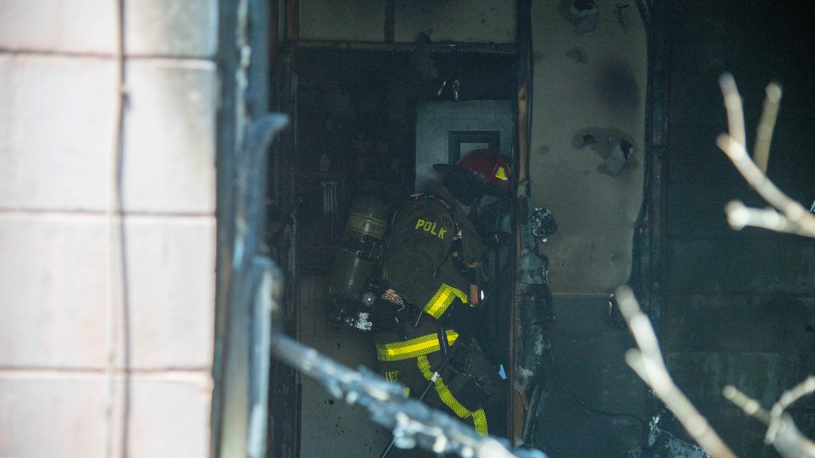 Woman found dead in backyard during Highland City house fire