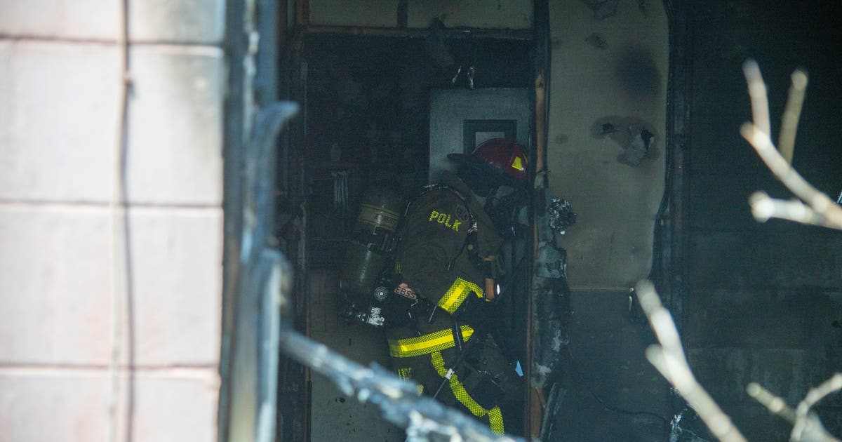 Woman found dead in backyard during Highland City house fire